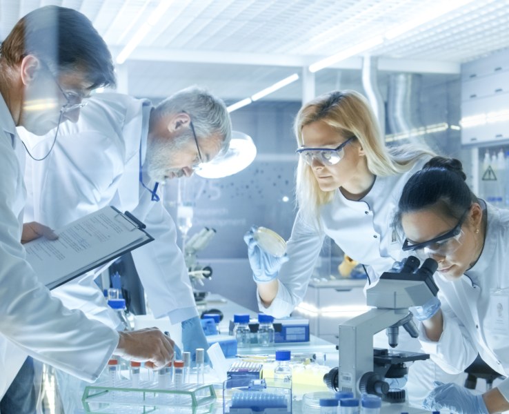 WuXi laboratory team collaborating on scientific work